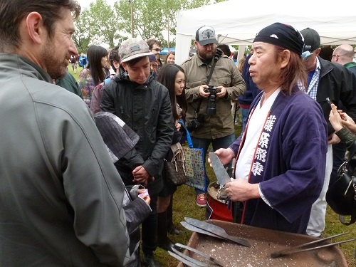 Mr. Fujiwara explaining the process of knife-making